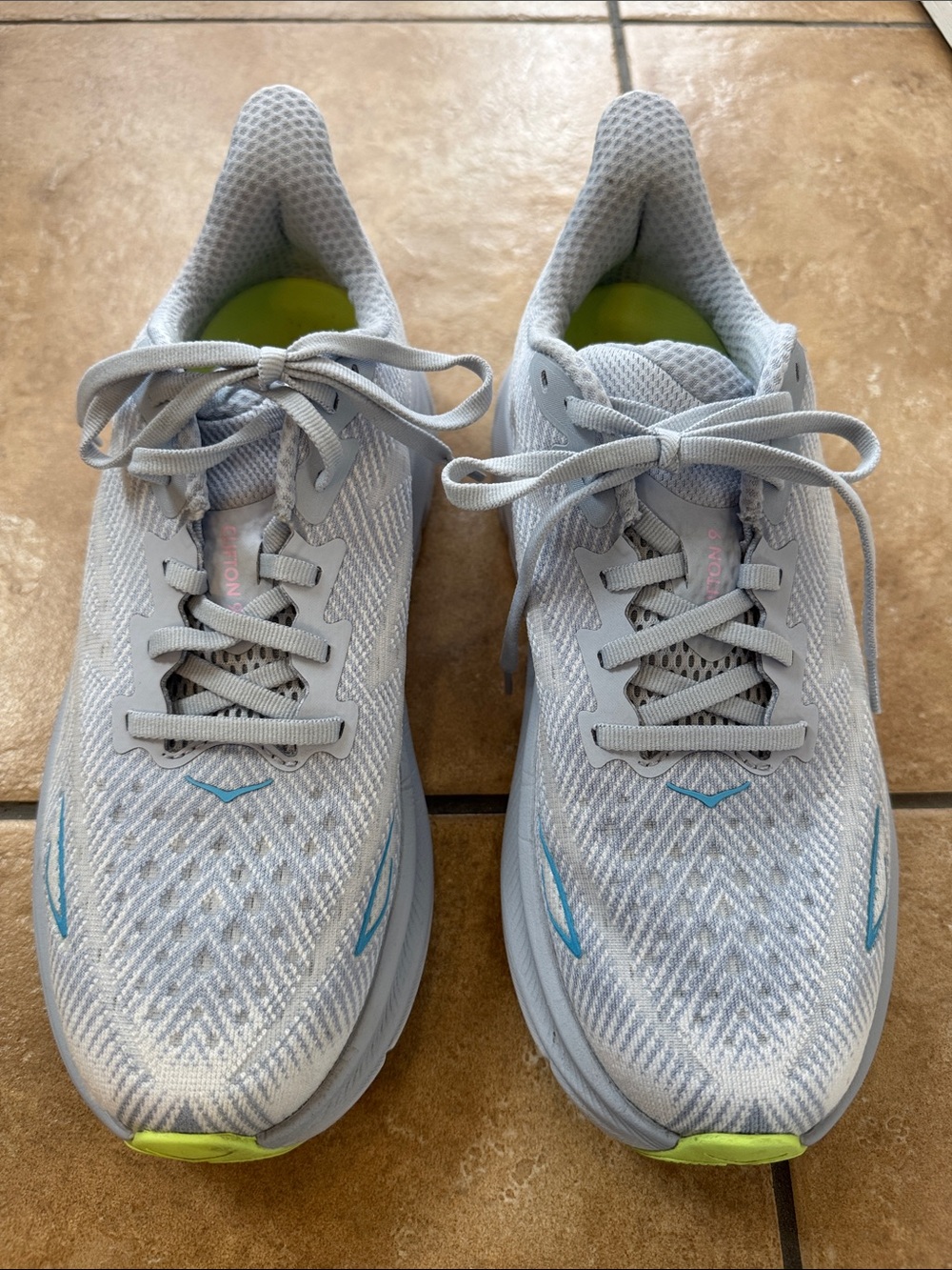 Hoka One One Women's Light Gray Running Shoes with Blue and Neon Yellow Accents